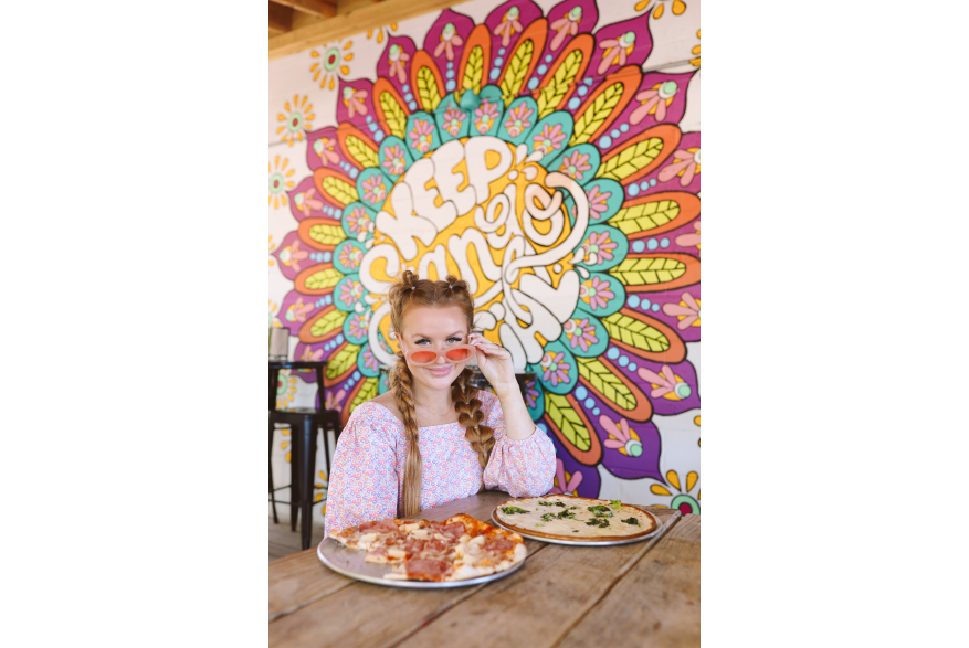 enjoying pizza at The Thirsty Goat