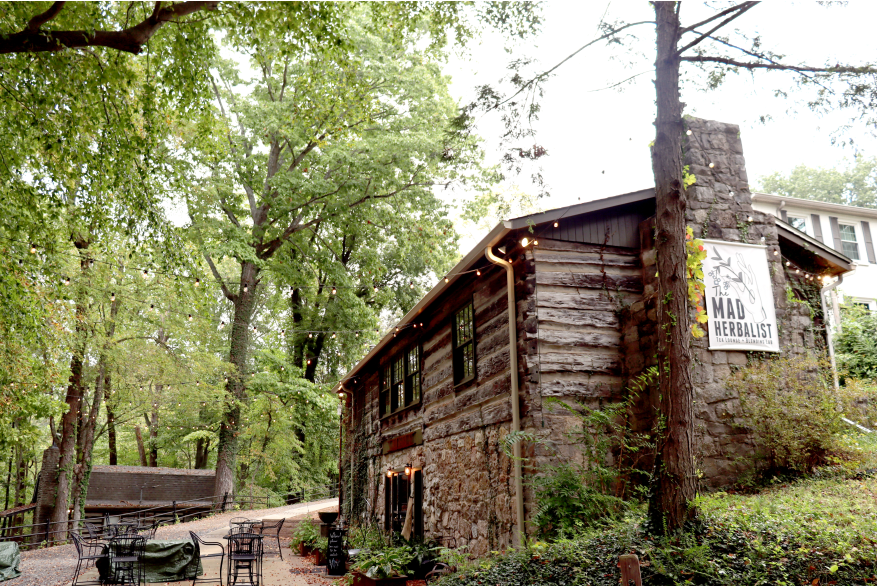 a cabin-style restaurant in a wooded setting