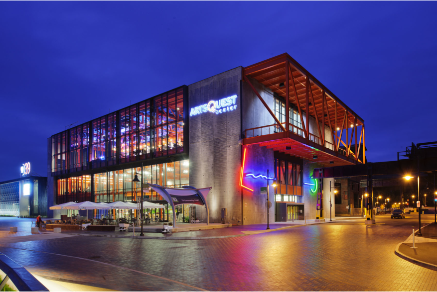 Exterior of ArtsQuest™ Center at SteelStacks™ with bright lights