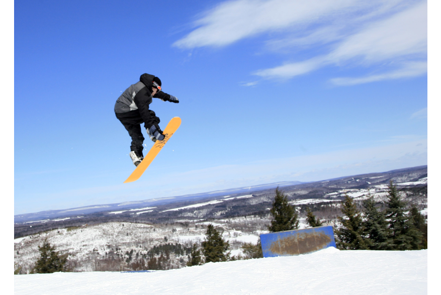 Snowboarding jumping at Blue Mountain Resort