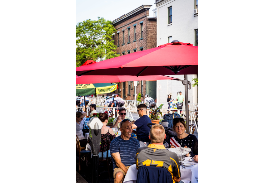 Diners along Ferry Street during the 2022 Easton Twilight Criterium in Easton, Pa.