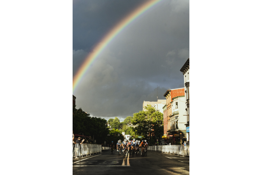 A rainbow glows across the sky during the 2022 Easton Twilight Criterium in Easton, Pa.