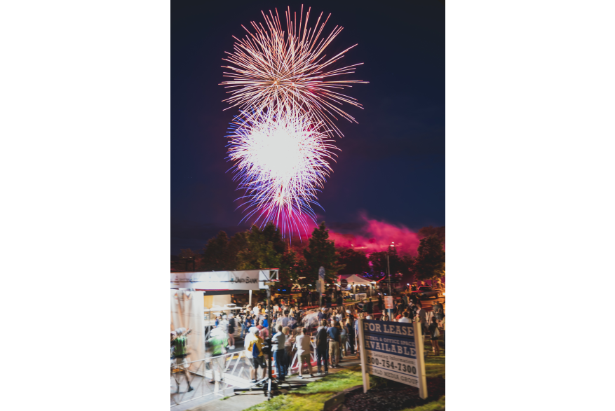 Fireworks burst across the night sky to celebrate the 2022 Easton Twilight Criterium in Easton, Pa.