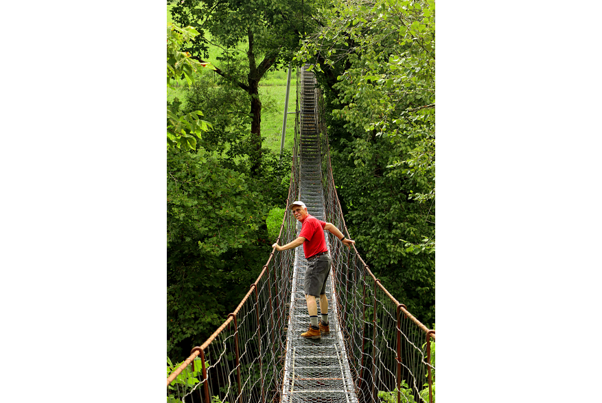 #CaptureTheKentuckyWildlands Photo Contest May/June 2021 - People - Swinging Bridge in Clay County Photo by Peggy Yaeger