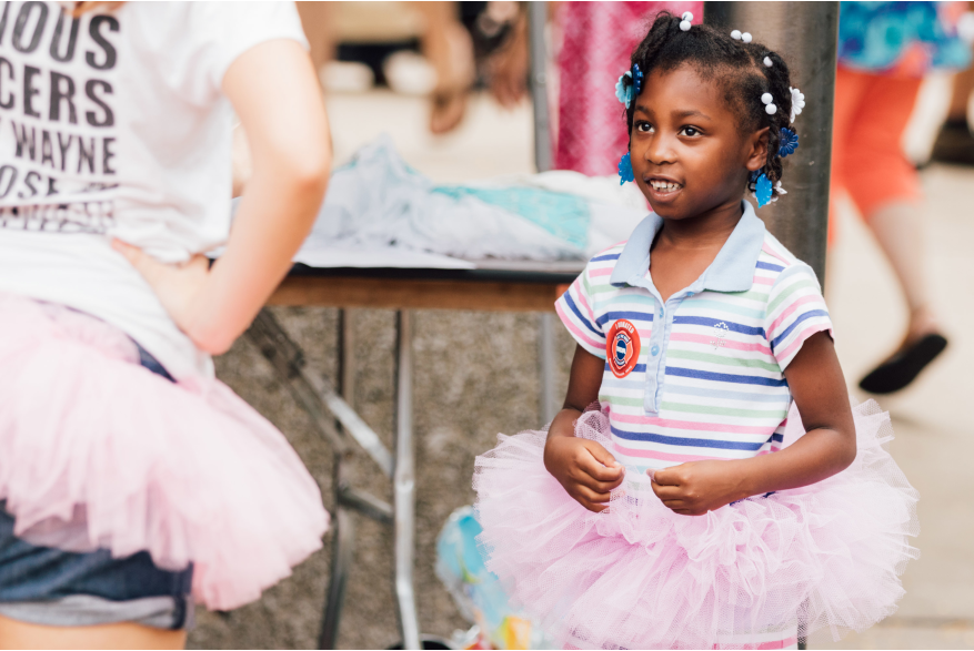 Girl Trying Ballet at Taste of the Arts