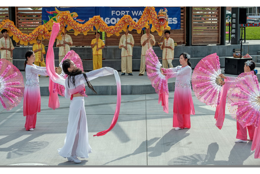 Dancers celebrate the Dragon Boat races at Promenade Park