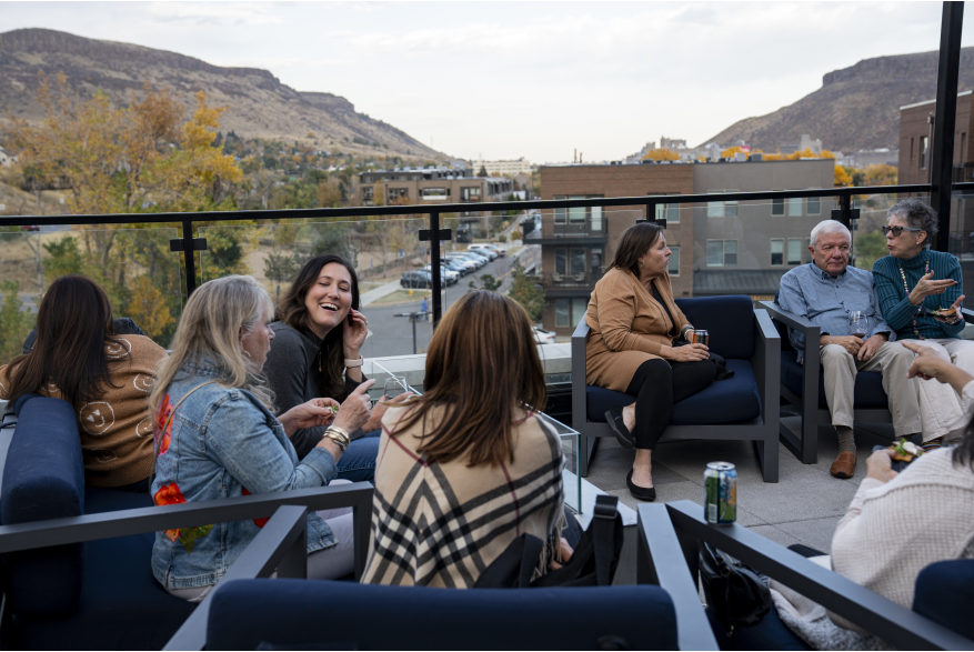 Group on rooftop patio at the Eddy Hotel