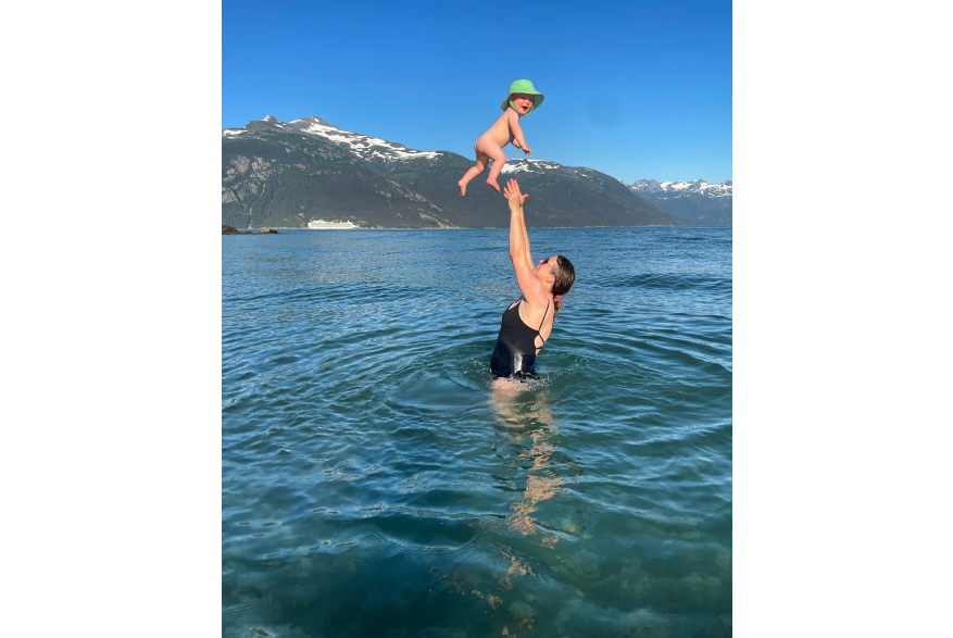 Eddy enjoys an ocean swim on a rare 80 degree day