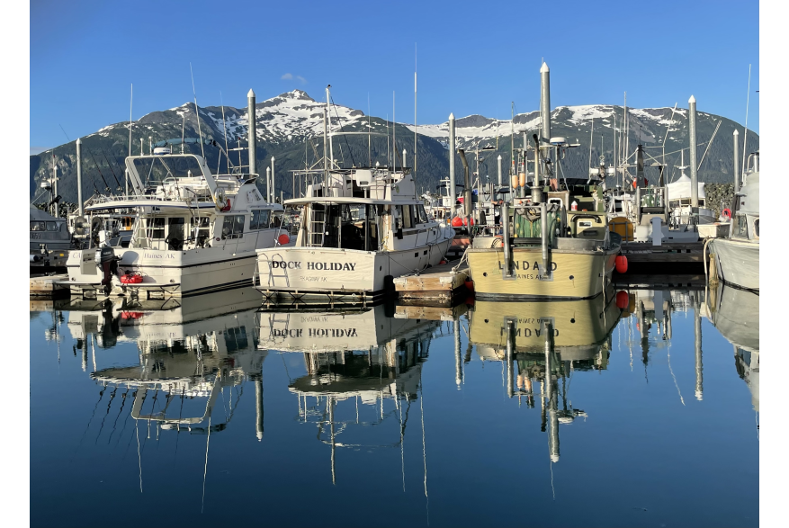Reflections of boats at the Haines downtown Harbor