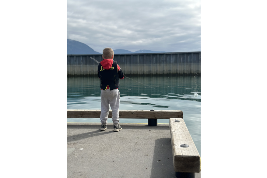 young boy fishing Haines boat habor dock