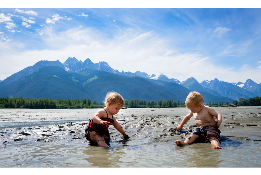 Babies playing on the chilkat side on the flats