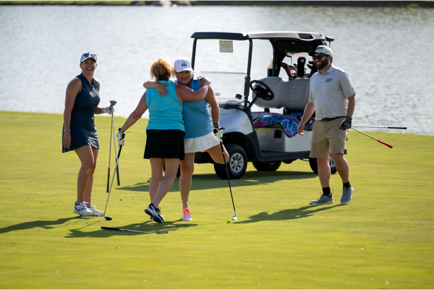 Indiana Sports Corp - Golfers Celebrate