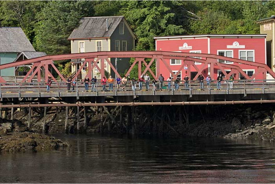 Fishing for salmon on the Stedman Street bridge near Creek Street
