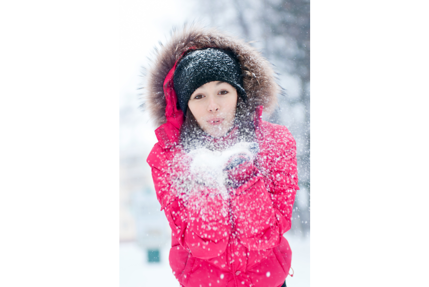 Woman Playing in NY Snow
