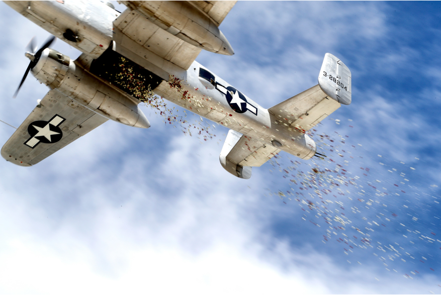 Plane dropping roses on Memorial Day