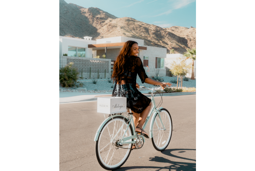 Woman on bike from Melvyn's