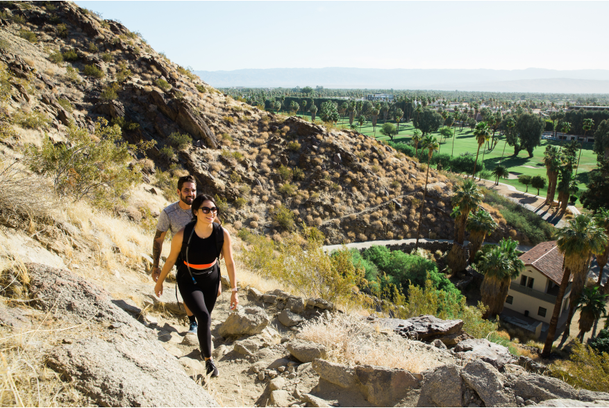 Two people hiking on Lykken trail.