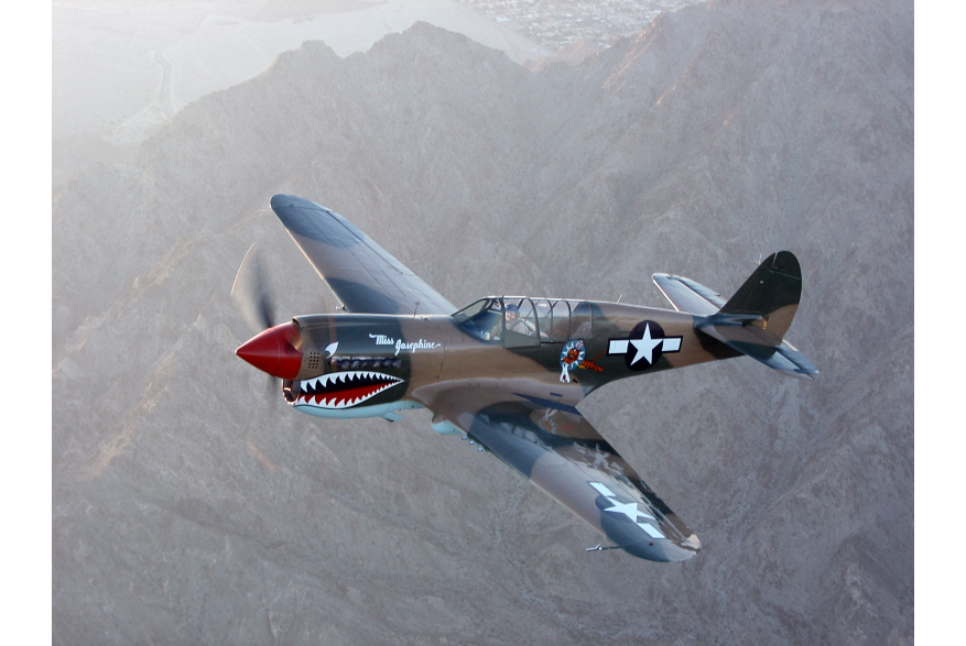 Palm Springs Air Museum plane in the air.