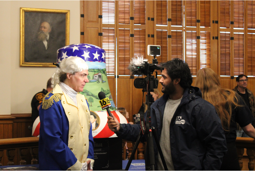 An individual being interviewed by the media at Monroe County's America250PA kick-off event