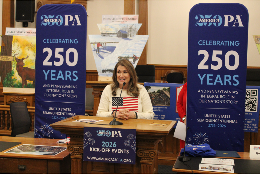 An individual speaking at Monroe County's America250PA kick-off event