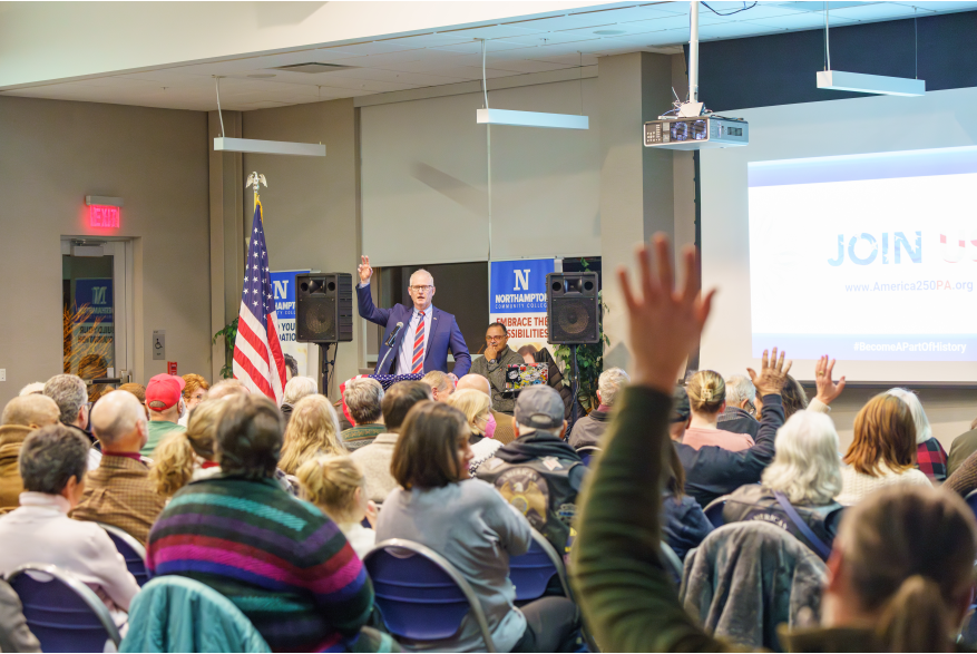 Man gives a presentation at Monroe County's America250PA Kick Off Event