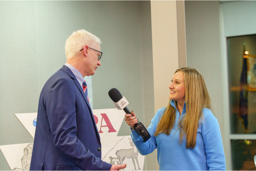 A reporter doing an interview at Monroe County's America250PA Kick Off Event