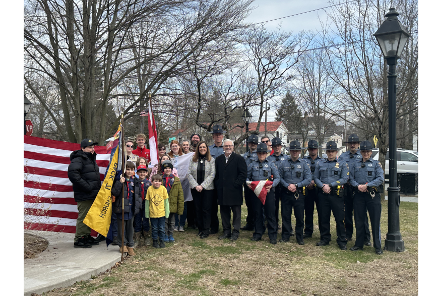 Local scouts and Pike County Sheriff’s Office posing at the Flags Across the Commonwealth event.