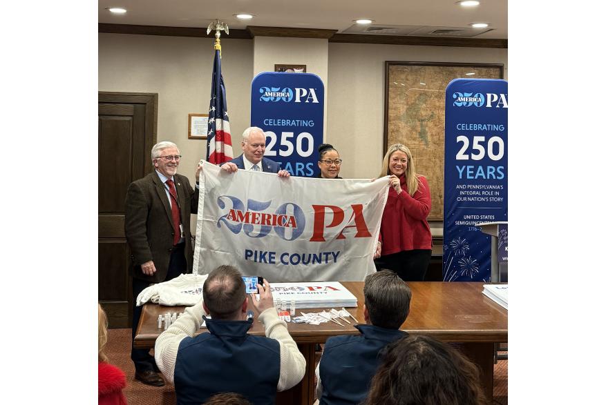 A group posing at Pike County's America250PA kick-off event