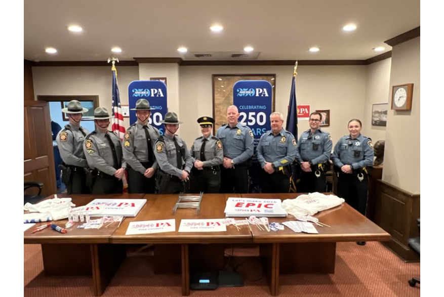 A group of police officers posing at Pike County's America250PA kick-off event