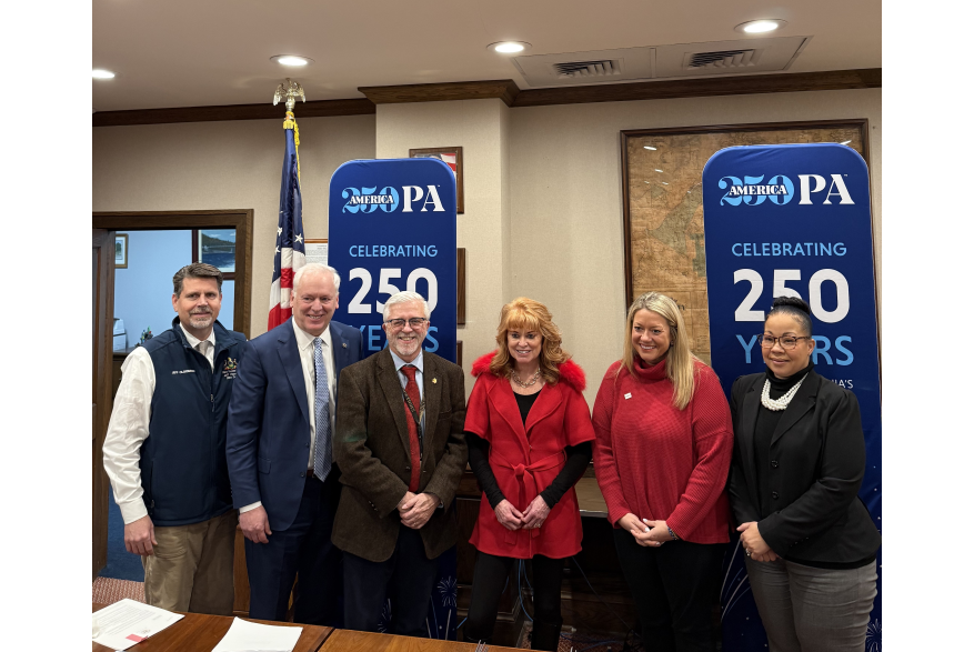 A group posing at Pike County's America250PA kick-off event