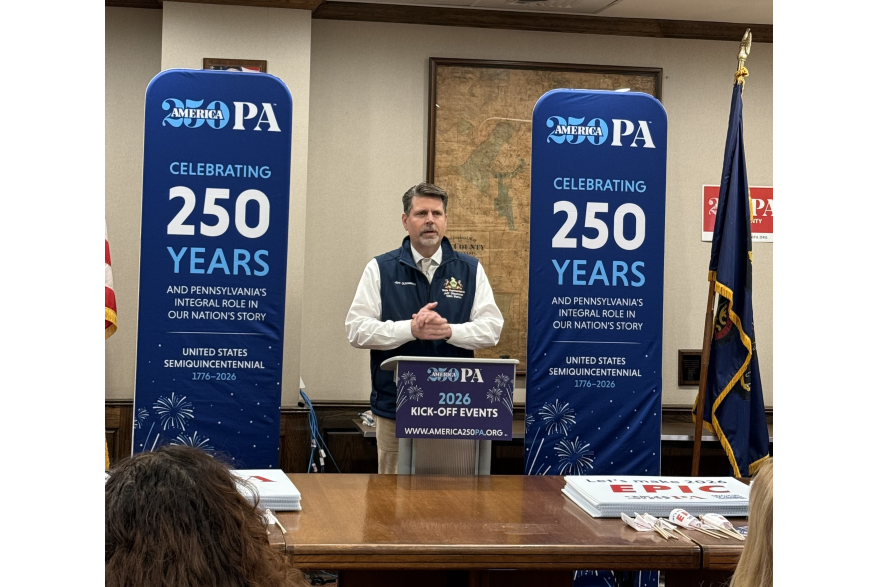 An individual speaking at Pike County's America250PA kick-off event
