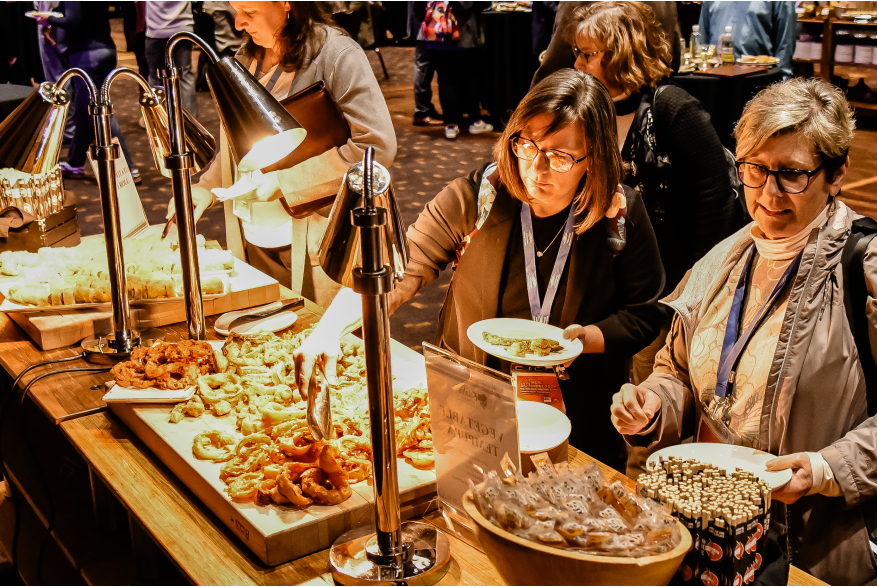 Attendees enjoying the food during the reception at More Front Doors: The Pocono Housing Summit