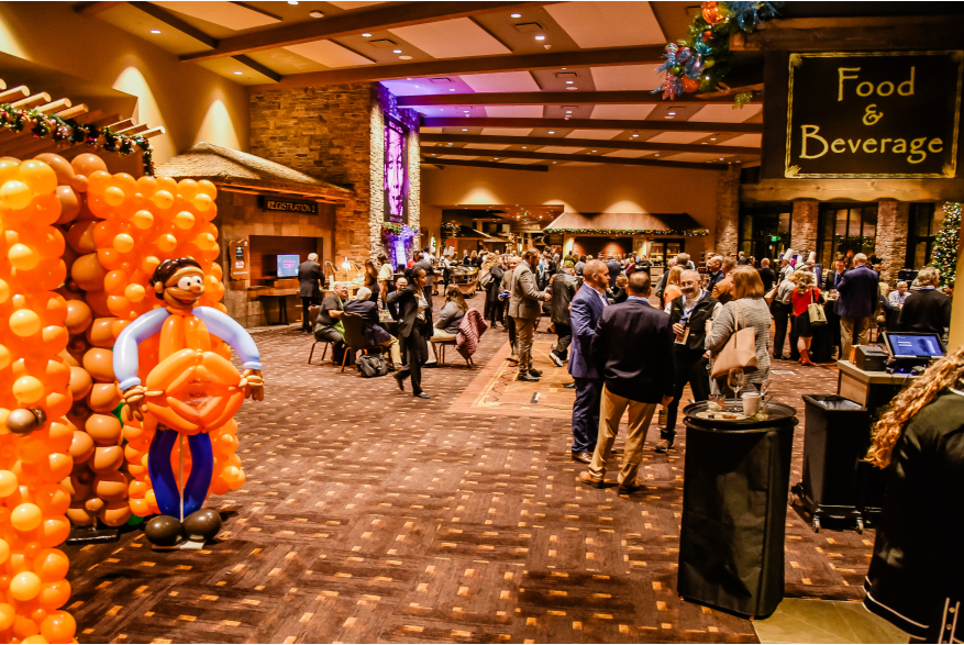 Attendees networking in the lobby at More Front Doors: The Pocono Housing Summit