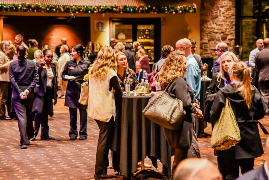 Attendees networking in the lobby at More Front Doors: The Pocono Housing Summit