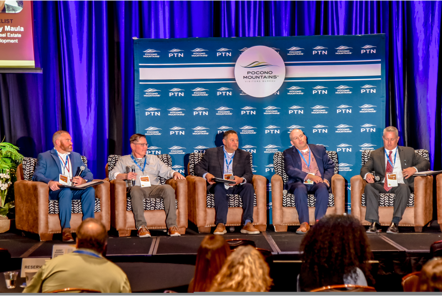 A panel of speakers having a discussion at More Front Doors: The Pocono Housing Summit