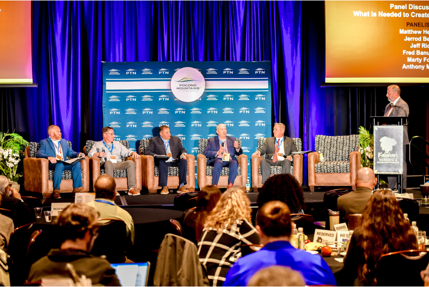 A panel of speakers having a discussion at More Front Doors: The Pocono Housing Summit