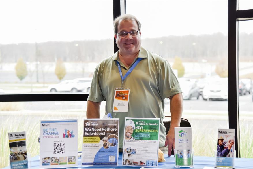 A vendor representing his business at More Front Doors: The Pocono Housing Summit