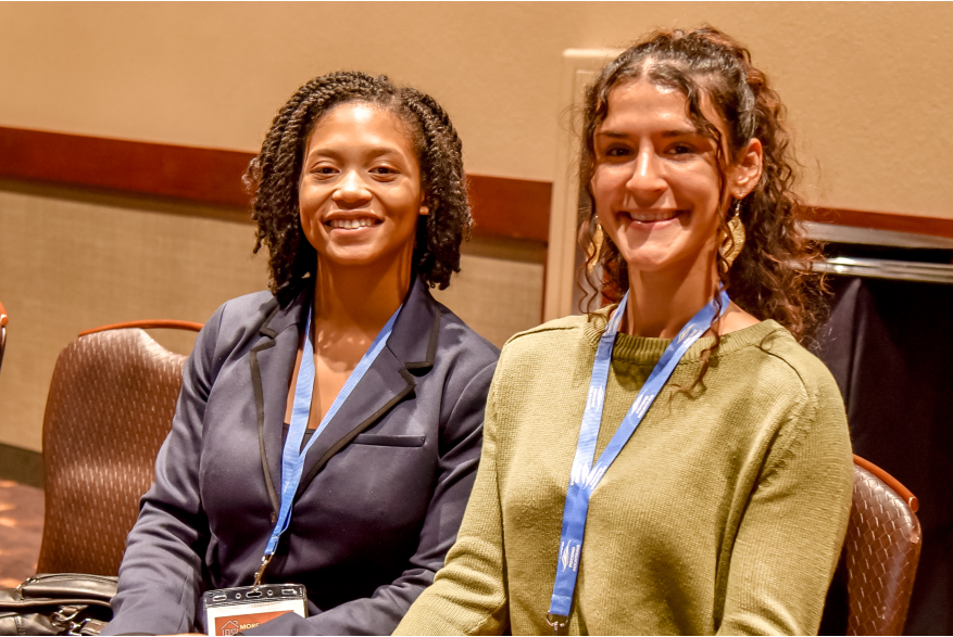 Two women posing for a picture during the More Front Doors: The Pocono Housing Summit