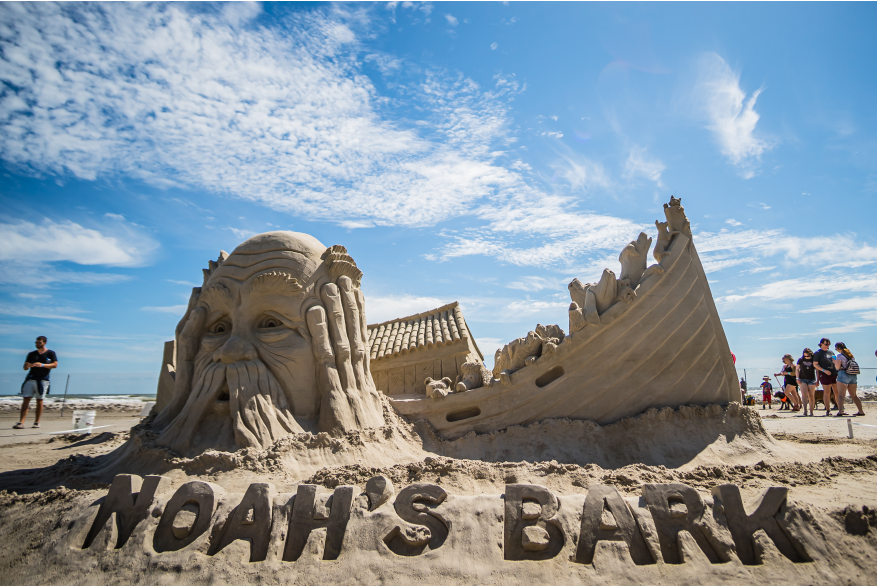 Noahs ark sand sculpture with only dogs in the boat, "Noahs Bark".