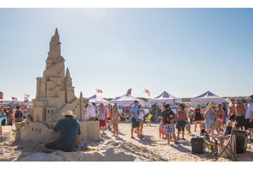 People browse sand castle creations at Texas Sandfest