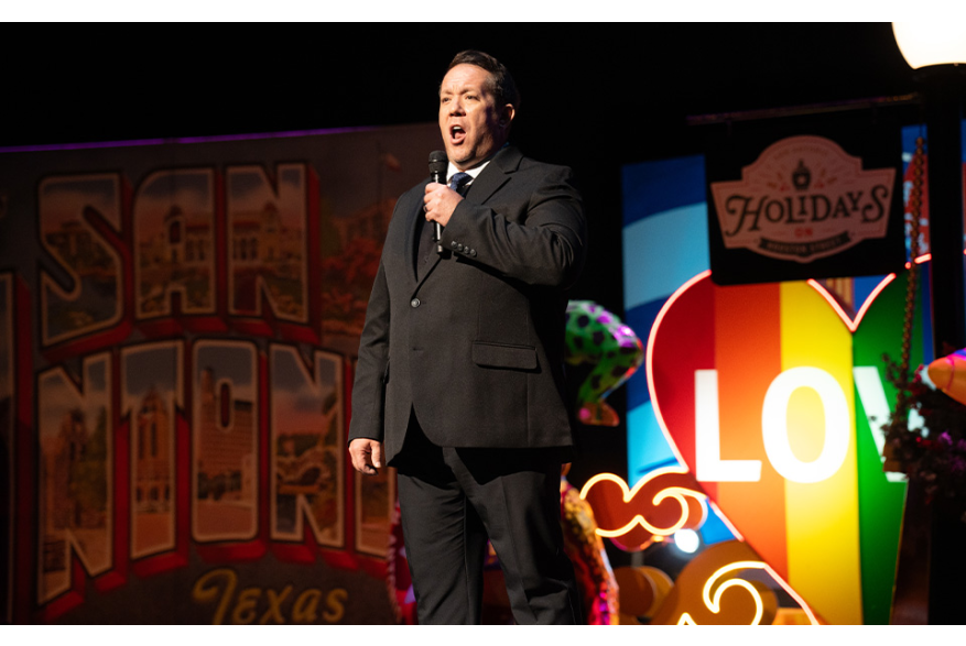 Man singing opera onstage.