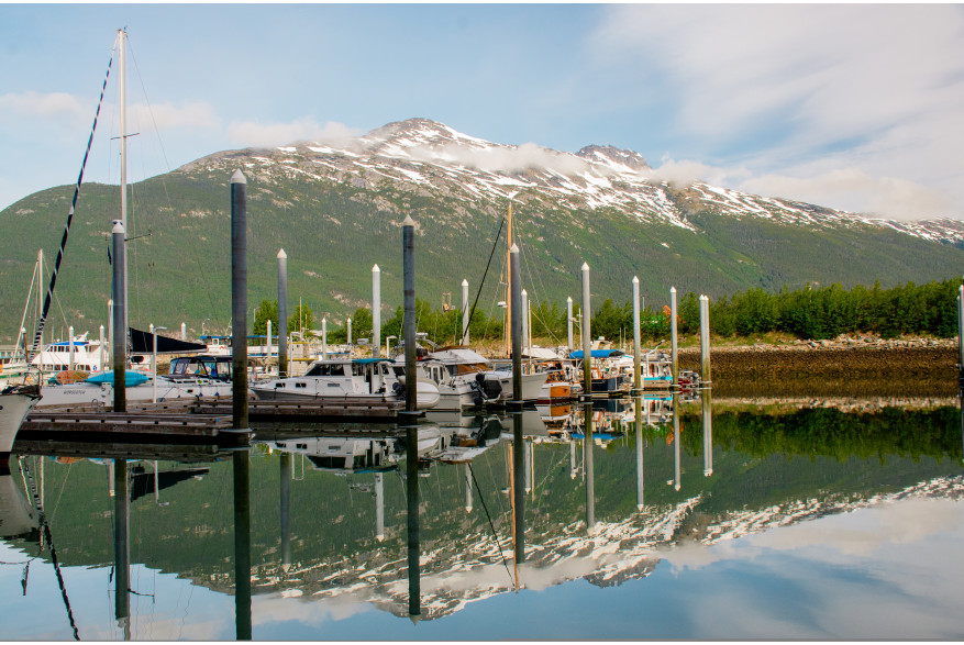 The small boat marina in the early morning in June.