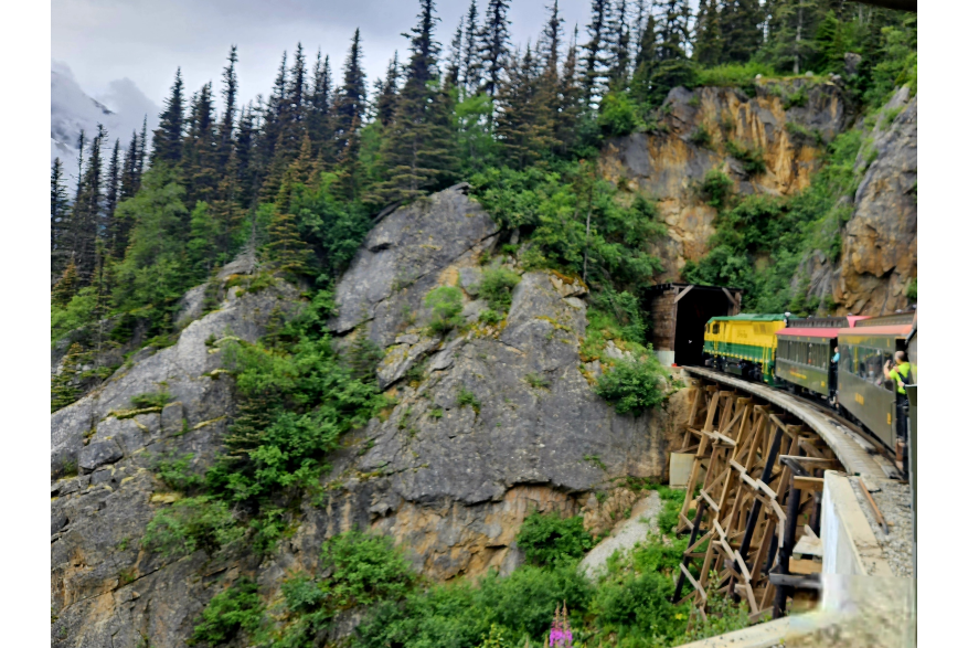 White Pass and Yukon Route train crossing a bridge.
