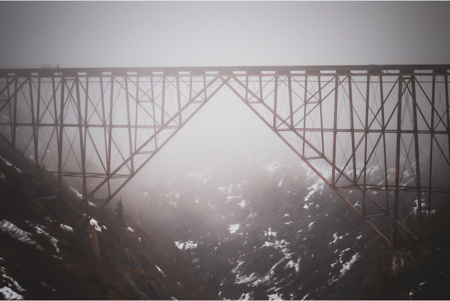 The bridge kissed by mist as seen from the train