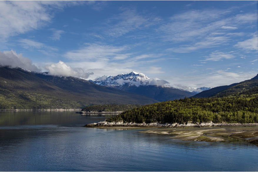 Image of a stunning mountain on a clear day from the top of a ship in the terminal at the port of Skagway.