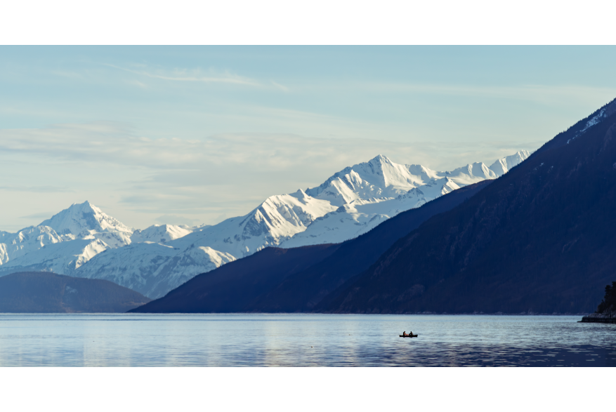 Two fishermen check shrimp pots from a canoe in Nanku Bay between Skagway and Dyea.