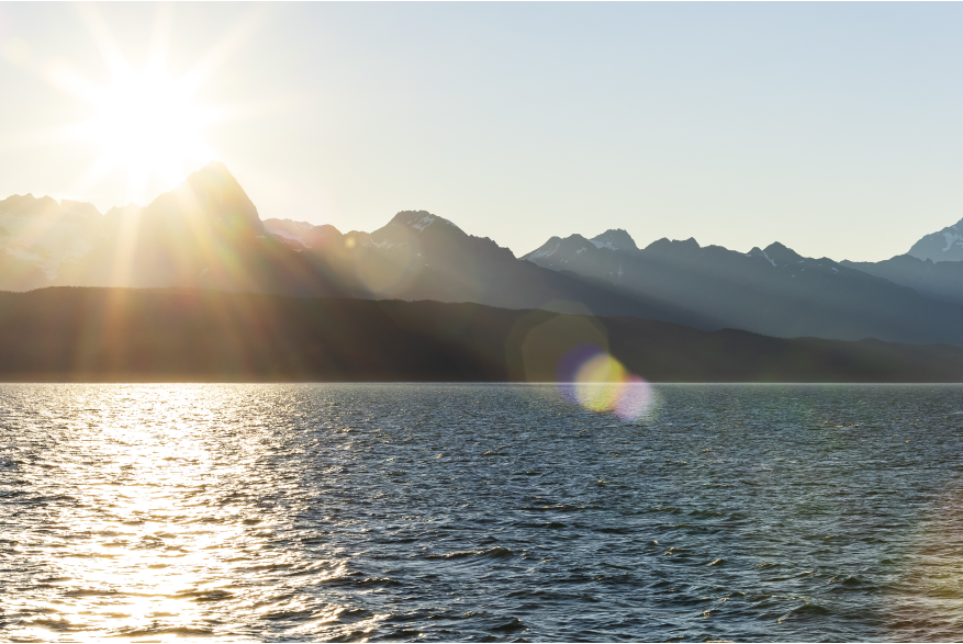 Sun setting over mountains along Lynn Canal