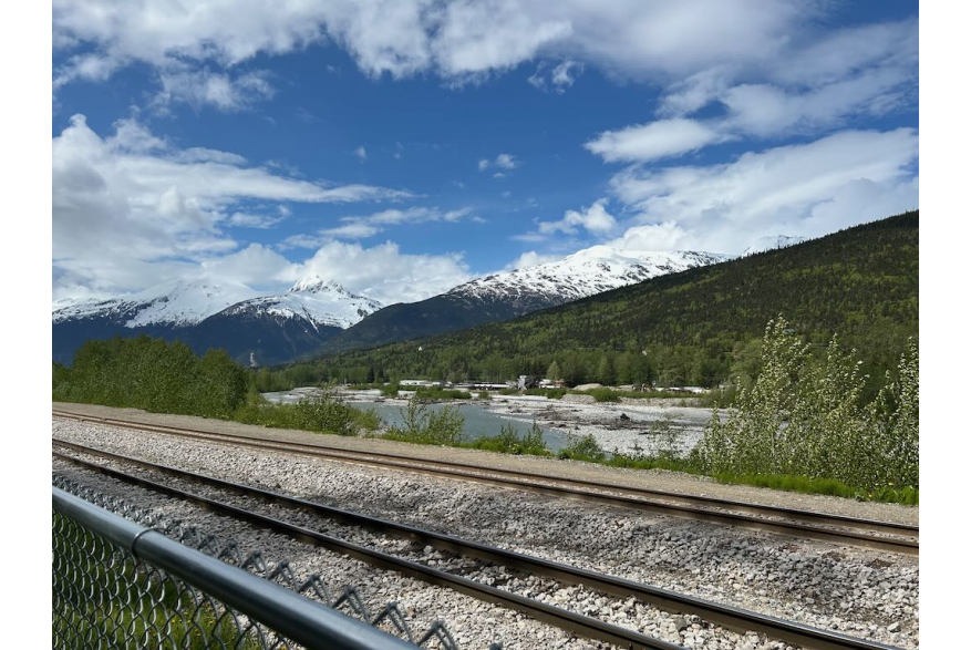 Looking over the railway from the cemetery to the mountains.