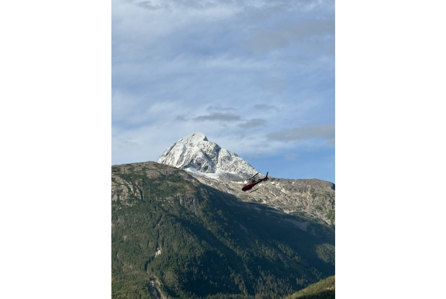Helicopter over mountains