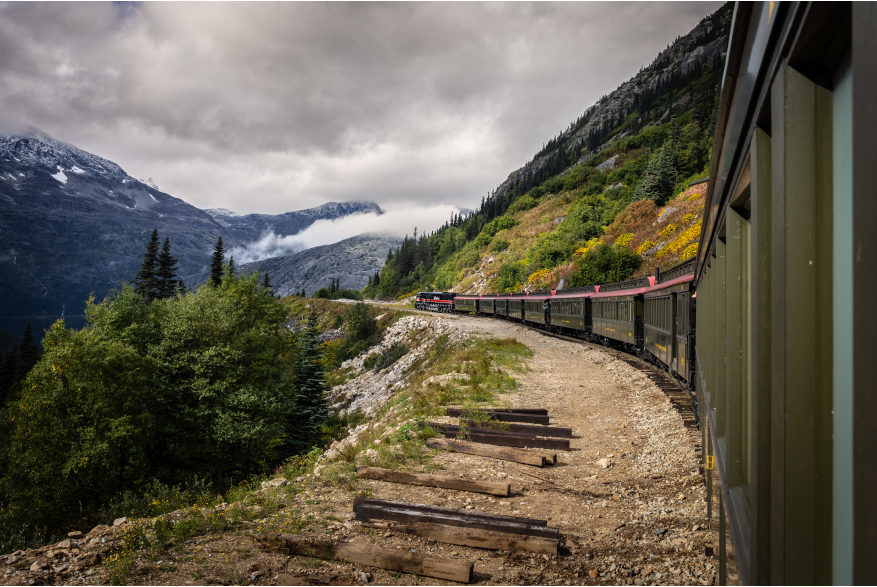 Captured this image from the platform of the white pass train, locomotive entering a mountain tunnel. Photographed in September 2026.